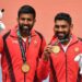India's gold medallists Divij Sharan (R) and Rohan Bopanna (L) pose for photographers during the medal ceremony for men's doubles tennis at the 2018 Asian Games in Palembang on August 24, 2018. / AFP PHOTO / ADEK BERRY