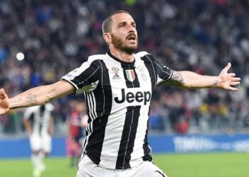 FILE - In this Sunday, April 23, 2017 filer, Juventus' Leonardo Bonucci celebrates after scoring a goal during the Serie A soccer match between Juventus and Genoa at the Juventus stadium in Turin, Italy.Bonucci won six Serie A titles in seven years at Juventus but the Italy defender joined Milan last year _ in what was the shock of the transfer window _ for a fee of more than 40 million euros ($45 million) amid reports of a dressing room spat. Juventus said on Thursday that the 31-year-old Bonucci, who has reportedly taken a pay cut to move back to Juventus, has signed a five-year deal. (Alessandro Di Marco/ANSA via AP)