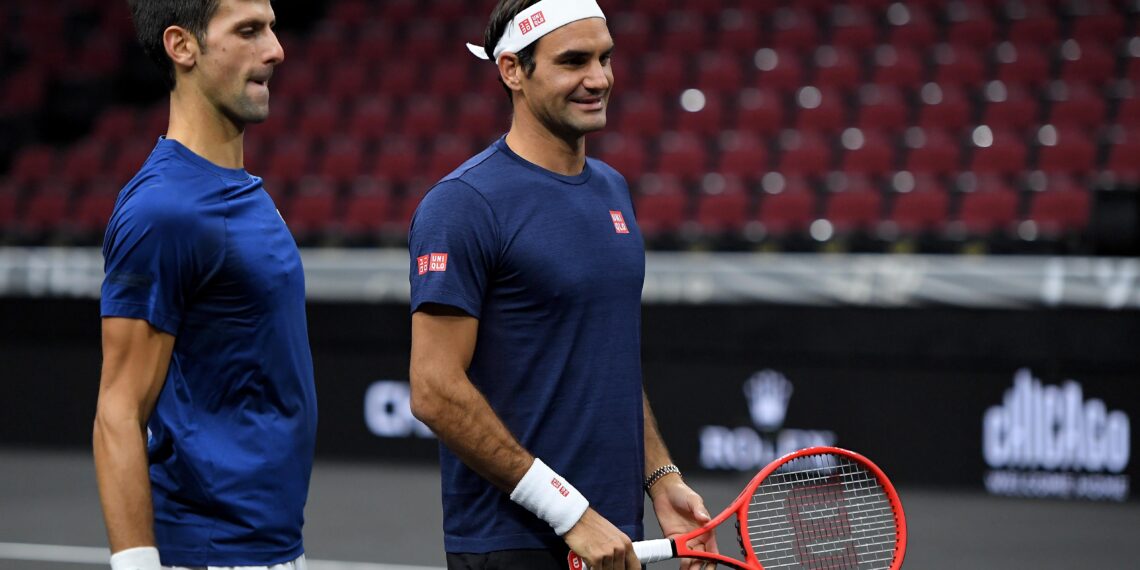 CHICAGO, IL - SEPTEMBER 20:  Team Europe Novak Djokovic of Serbia talks with Team Europe Roger Federer of Switzerland during practice prior to the Laver Cup at the United Center on September 20, 2018 in Chicago, Illinois. The Laver Cup consists of six players from Team World competing against their counterparts from Team Europe. John McEnroe will captain Team World and Team Europe will be captained by Bjorn Borg. The event runs from 21-23 Sept.  (Photo by Stacy Revere/Getty Images for The Laver Cup)