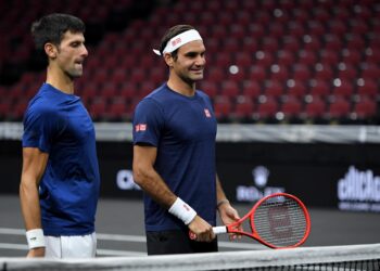CHICAGO, IL - SEPTEMBER 20:  Team Europe Novak Djokovic of Serbia talks with Team Europe Roger Federer of Switzerland during practice prior to the Laver Cup at the United Center on September 20, 2018 in Chicago, Illinois. The Laver Cup consists of six players from Team World competing against their counterparts from Team Europe. John McEnroe will captain Team World and Team Europe will be captained by Bjorn Borg. The event runs from 21-23 Sept.  (Photo by Stacy Revere/Getty Images for The Laver Cup)