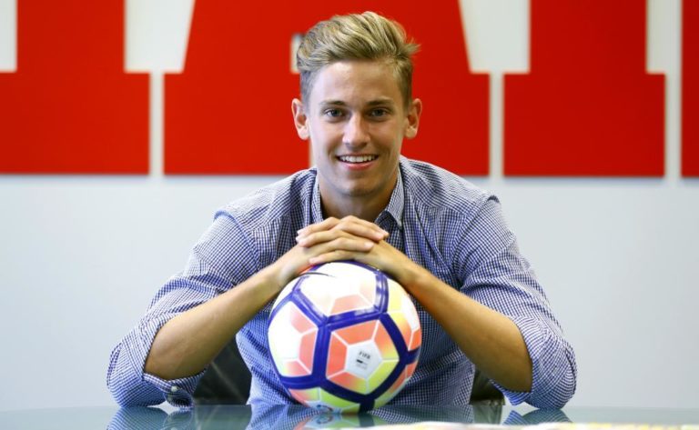 Atletico Madrid have signed Marcos Llorente from Real Madrid