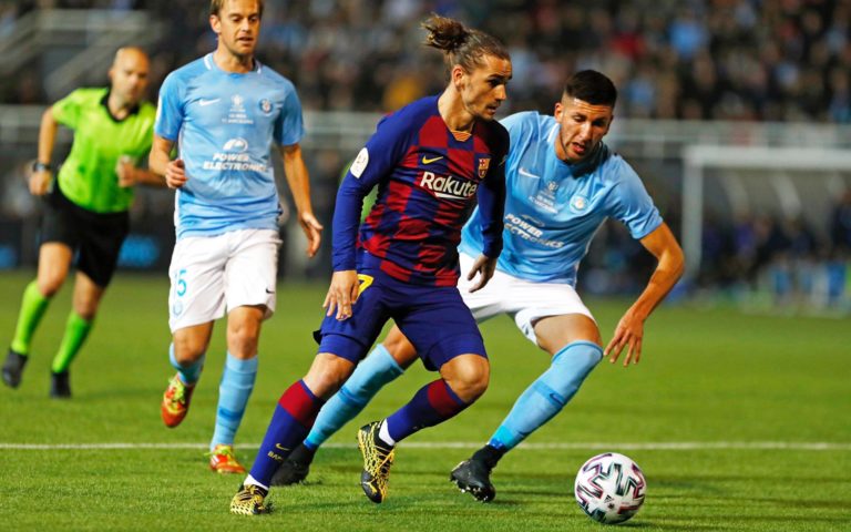 Griezmann says Barca is still adapting to playing with three centre-backs