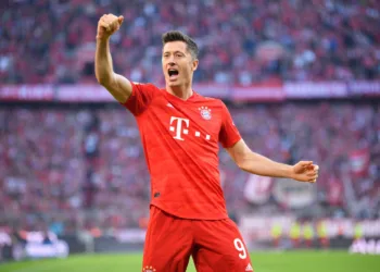 MUNICH, GERMANY - OCTOBER 26: Robert Lewandowski of FC Bayern Munich celebrates after scoring his team's second goal during the Bundesliga match between FC Bayern Muenchen and 1. FC Union Berlin at Allianz Arena on October 26, 2019 in Munich, Germany. (Photo by Sebastian Widmann/Bongarts/Getty Images)