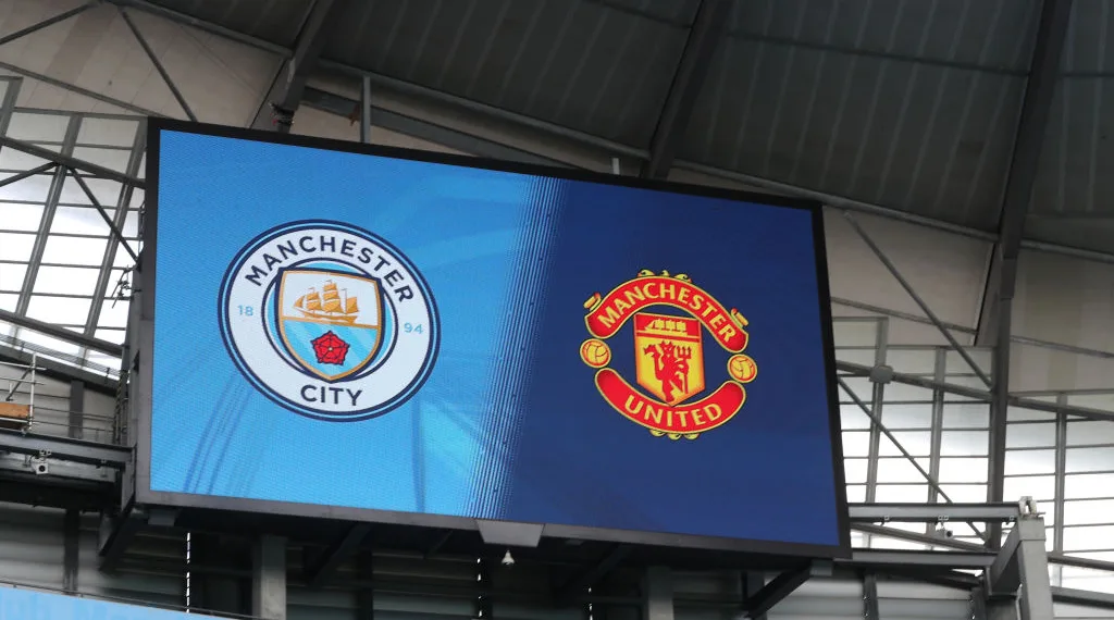 MANCHESTER, ENGLAND - SEPTEMBER 07: General view of the screen showing the club badges ahead of the Barclays FA Women's Super League match between Manchester City and Manchester United at Etihad Stadium on September 07, 2019 in Manchester, United Kingdom. (Photo by Catherine Ivill/Getty Images)