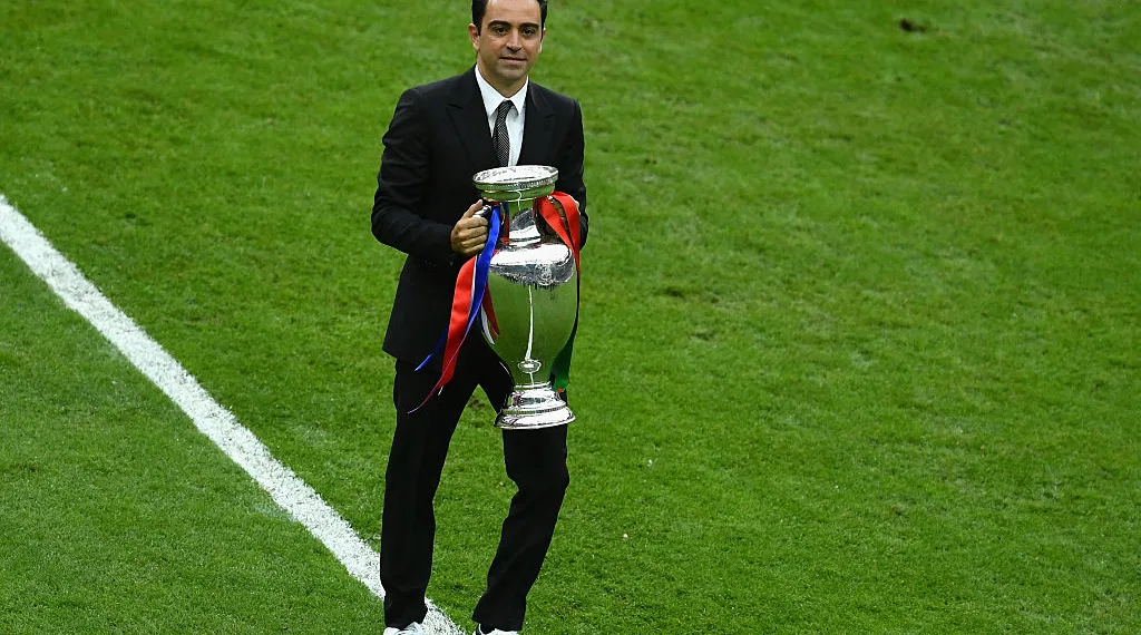 PARIS, FRANCE - JULY 10: Xavi Hernandez holds the Henri Delaunay trophy prior to the UEFA EURO 2016 Final match between Portugal and France at Stade de France on July 10, 2016 in Paris, France.  (Photo by Dan Mullan/Getty Images)