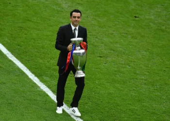PARIS, FRANCE - JULY 10: Xavi Hernandez holds the Henri Delaunay trophy prior to the UEFA EURO 2016 Final match between Portugal and France at Stade de France on July 10, 2016 in Paris, France.  (Photo by Dan Mullan/Getty Images)