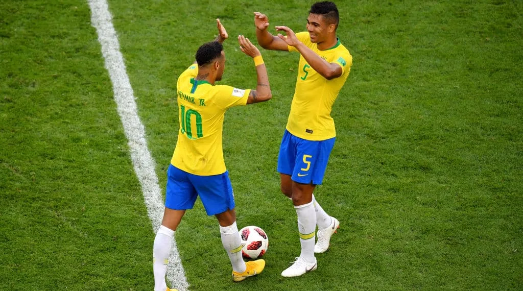 SAMARA, RUSSIA - JULY 02: Neymar Jr Casemiro of Brazil celebrate victory following the 2018 FIFA World Cup Russia Round of 16 match between Brazil and Mexico at Samara Arena on July 2, 2018 in Samara, Russia. (Photo by Hector Vivas/Getty Images)