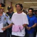 Brazilian retired football player Ronaldinho (C) and his brother Roberto Assis (R) arrive at Asuncion's Justice Palace to appear before a public prosecutor who will decide whether to grant them bail or not following their irregular entry to the country, in Asuncion, on March 7, 2020. - Former Brazilian football star Ronaldinho and his brother have been detained in Paraguay after allegedly using fake passports to enter the South American country, authorities said Wednesday. (Photo by Norberto DUARTE / AFP) (Photo by NORBERTO DUARTE/AFP via Getty Images)