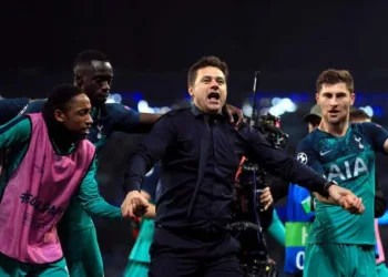 Tottenham Hotspur's Kyle Walker-Peters, manager Mauricio Pochettino and Ben Davies celebrate after the UEFA Champions League quarter final second leg match at the Etihad Stadium, Manchester.