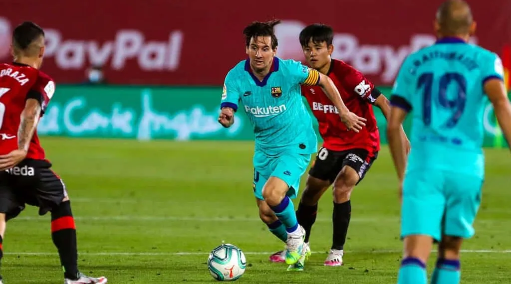 Messi scores 20 goals for the 12th consecutive season as Barcelona thrashes Mallorca by 4-0