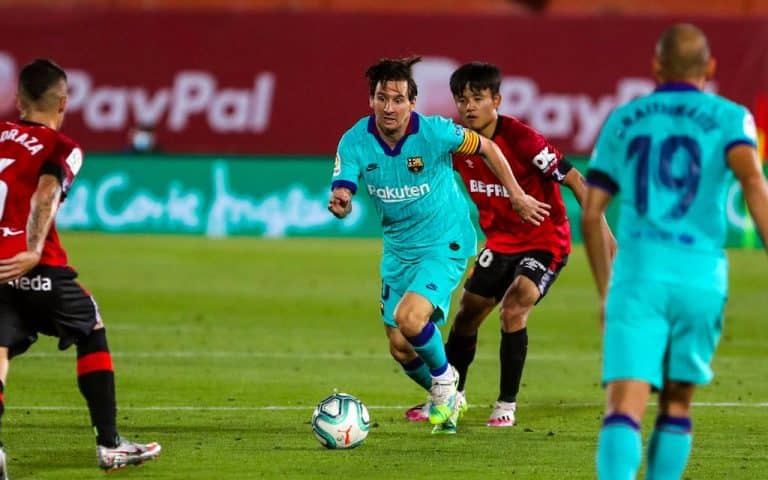 Messi scores 20 goals for the 12th consecutive season as Barcelona thrashes Mallorca by 4-0