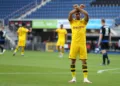 PADERBORN, GERMANY - MAY 31: Achraf Hakimi Mouh of Borussia Dortmund celebrates scoring his teams fourth goal of the game during the Bundesliga match between SC Paderborn 07 and Borussia Dortmund at Benteler Arena on May 31, 2020 in Paderborn, Germany. (Photo by Lars Baron/Getty Images)