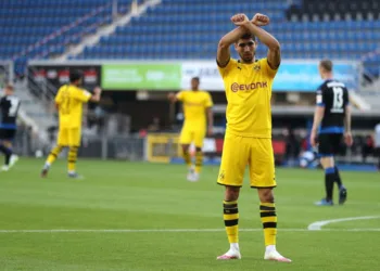 PADERBORN, GERMANY - MAY 31: Achraf Hakimi Mouh of Borussia Dortmund celebrates scoring his teams fourth goal of the game during the Bundesliga match between SC Paderborn 07 and Borussia Dortmund at Benteler Arena on May 31, 2020 in Paderborn, Germany. (Photo by Lars Baron/Getty Images)