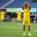 PADERBORN, GERMANY - MAY 31: Achraf Hakimi Mouh of Borussia Dortmund celebrates scoring his teams fourth goal of the game during the Bundesliga match between SC Paderborn 07 and Borussia Dortmund at Benteler Arena on May 31, 2020 in Paderborn, Germany. (Photo by Lars Baron/Getty Images)