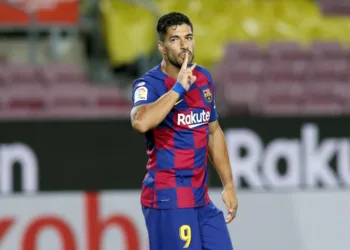 Barcelona manages to keep title race dream alive defeating Espanyol