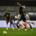 Manchester United's Portuguese midfielder Bruno Fernandes scores the opening goal from the penalty spot during the UEFA Europa League semi-final football match Sevilla v Manchester United on August 16, 2020 in Cologne, western Germany. (Photo by Ina Fassbender / POOL / AFP) (Photo by INA FASSBENDER/POOL/AFP via Getty Images)