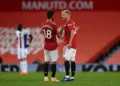 MANCHESTER, ENGLAND - SEPTEMBER 19: Donny Van De Beek of Manchester United speaks with Bruno Fernandes of Manchester United during the Premier League match between Manchester United and Crystal Palace at Old Trafford on September 19, 2020 in Manchester, England. (Photo by Shaun Botterill/Getty Images)