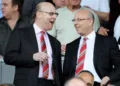 MANCHESTER, ENGLAND - APRIL 09: Manchester United Co-Chairmen Joel Glazer (R) and Avram Glazer talk during the Barclays Premier League match between Manchester United and Fulham at Old Trafford on April 9, 2011 in Manchester, England.  (Photo by Michael Regan/Getty Images)