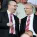 MANCHESTER, ENGLAND - APRIL 09: Manchester United Co-Chairmen Joel Glazer (R) and Avram Glazer talk during the Barclays Premier League match between Manchester United and Fulham at Old Trafford on April 9, 2011 in Manchester, England.  (Photo by Michael Regan/Getty Images)