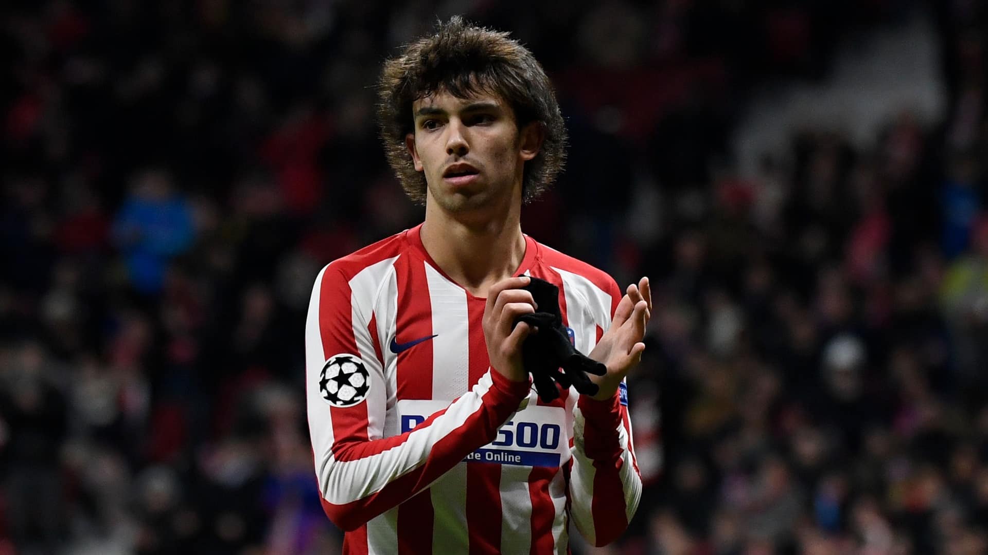 Atletico Madrid's Portuguese forward Joao Felix applauds  during the UEFA Champions League football match between Club Atletico de Madrid and Lokomotiv Moscow at the Wanda Metropolitano stadium in Madrid on December 11, 2019. (Photo by PIERRE-PHILIPPE MARCOU / AFP) (Photo by PIERRE-PHILIPPE MARCOU/AFP via Getty Images)