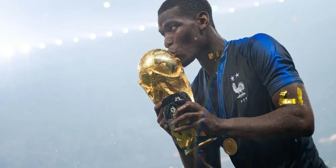 MOSCOW, RUSSIA - JULY 15: Paul Pogba of France celebrates with the World Cup Trophy following his sides victory in the 2018 FIFA World Cup Final between France and Croatia at Luzhniki Stadium on July 15, 2018 in Moscow, Russia. (Photo by Matthias Hangst/Getty Images)