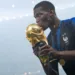 MOSCOW, RUSSIA - JULY 15: Paul Pogba of France celebrates with the World Cup Trophy following his sides victory in the 2018 FIFA World Cup Final between France and Croatia at Luzhniki Stadium on July 15, 2018 in Moscow, Russia. (Photo by Matthias Hangst/Getty Images)