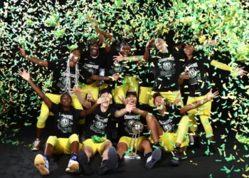 PALMETTO, FL - OCTOBER 6: The Seattle Storm poses for a team portrait with the WNBA Championship Trophy after winning Game 3 of the 2020 WNBA Finals against the Las Vegas Aces on October 6, 2020 at Feld Entertainment Center in Palmetto, Florida. NOTE TO USER: User expressly acknowledges and agrees that, by downloading and/or using this Photograph, user is consenting to the terms and conditions of the Getty Images License Agreement. Mandatory Copyright Notice: Copyright 2020 NBAE (Photo by Ned Dishman/NBAE via Getty Images)