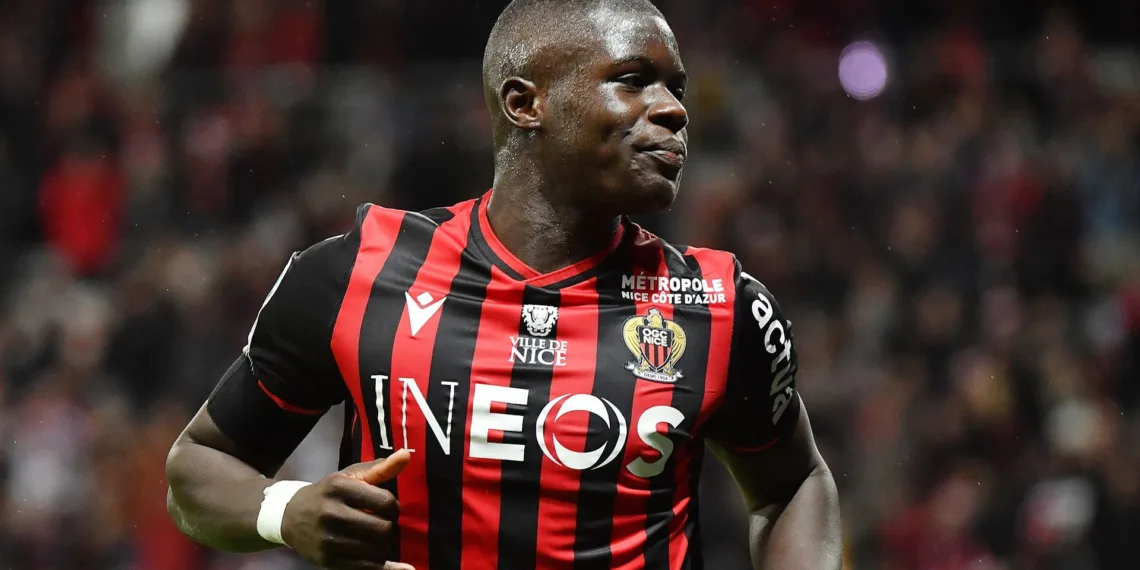 Nice's French defender Malang Sarr celebrates after scoring a goal during the French L1 football match between OGC Nice (OGCN) and Toulouse FC (TFC) at the Allianz Riviera stadium, in Nice, southeastern France, on December 21, 2019. (Photo by YANN COATSALIOU / AFP) (Photo by YANN COATSALIOU/AFP via Getty Images)