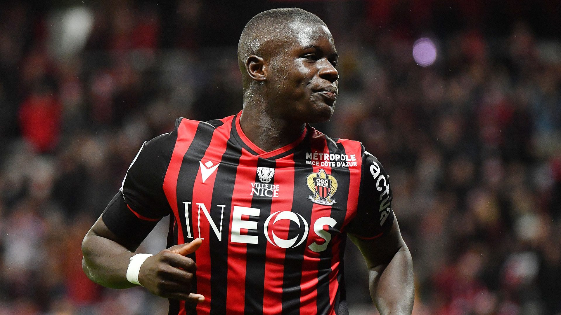 Nice's French defender Malang Sarr celebrates after scoring a goal during the French L1 football match between OGC Nice (OGCN) and Toulouse FC (TFC) at the Allianz Riviera stadium, in Nice, southeastern France, on December 21, 2019. (Photo by YANN COATSALIOU / AFP) (Photo by YANN COATSALIOU/AFP via Getty Images)