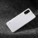 Realme Q2 teased by the company executive, to feature light gray leather back panel