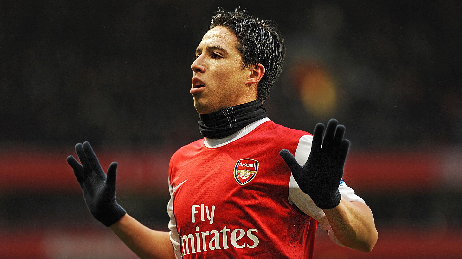 Arsenal's French  midfielder Samir Nasri celebrates scoring the opening goal of the English Premier League football match between Arsenal and Fulham at the Emirates stadium in north London on December 4, 2010. AFP PHOTO/BEN STANSALLFOR EDITORIAL USE ONLY Additional license required for any commercial/promotional use or use on TV or internet (except identical online version of newspaper) of Premier League/Football photos. Tel DataCo +44 207 2981656. Do not alter/modify photo. (Photo credit should read BEN STANSALL/AFP/Getty Images)