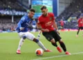 LIVERPOOL, ENGLAND - MARCH 01: Bruno Fernandes of Manchester United is challenged by Mason Holgate of Everton during the Premier League match between Everton FC and Manchester United at Goodison Park on March 01, 2020 in Liverpool, United Kingdom. (Photo by Clive Brunskill/Getty Images)