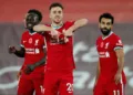 LIVERPOOL, ENGLAND - OCTOBER 31: Diogo Jota of Liverpool  celebrates after he scores his team's second goal  during the Premier League match between Liverpool and West Ham United at Anfield on October 31, 2020 in Liverpool, England. Sporting stadiums around the UK remain under strict restrictions due to the Coronavirus Pandemic as Government social distancing laws prohibit fans inside venues resulting in games being played behind closed doors. (Photo by Clive Brunskill/Getty Images)