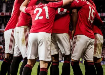 MANCHESTER, ENGLAND - NOVEMBER 10: Marcus Rashford of Manchester United celebrates scoring their third goal during the Premier League match between Manchester United and Brighton & Hove Albion at Old Trafford on November 10, 2019 in Manchester, United Kingdom. (Photo by Ash Donelon/Manchester United via Getty Images)
