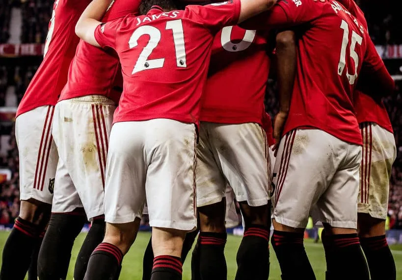 MANCHESTER, ENGLAND - NOVEMBER 10: Marcus Rashford of Manchester United celebrates scoring their third goal during the Premier League match between Manchester United and Brighton & Hove Albion at Old Trafford on November 10, 2019 in Manchester, United Kingdom. (Photo by Ash Donelon/Manchester United via Getty Images)