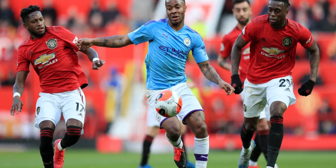 MANCHESTER, ENGLAND - MARCH 08: Fred of Manchester United and Aaron Wan-Bissaka of Manchester United battles for possession with Raheem Sterling of Manchester City  during the Premier League match between Manchester United and Manchester City at Old Trafford on March 08, 2020 in Manchester, United Kingdom. (Photo by Matt McNulty - Manchester City/Manchester City FC via Getty Images)