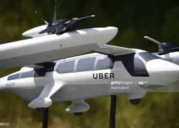 A model of Uber's electric vertical take-off  and  landing vehicle concept (eVTOL) flying taxi is displayed at the second annual Uber Elevate Summit, on May 8, 2018 at the Skirball Center in Los Angeles, California. - Uber introduced it's electric powered "flying taxi" vertical take-off and landing concept aircraft at the event, which showcases prototypes for UberAir's fleet of airborne taxis. (Photo by Robyn Beck / AFP)        (Photo credit should read ROBYN BECK/AFP via Getty Images)