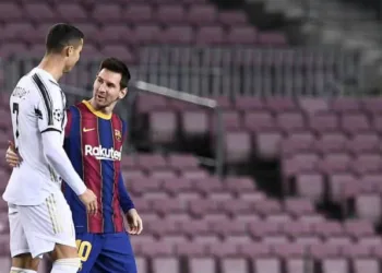 Juventus' Portuguese forward Cristiano Ronaldo greets Barcelona's Argentinian forward Lionel Messi (R) before the UEFA Champions League group G football match between Barcelona and Juventus at the Camp Nou stadium in Barcelona on December 8, 2020. (Photo by Josep LAGO / AFP) (Photo by JOSEP LAGO/AFP via Getty Images)