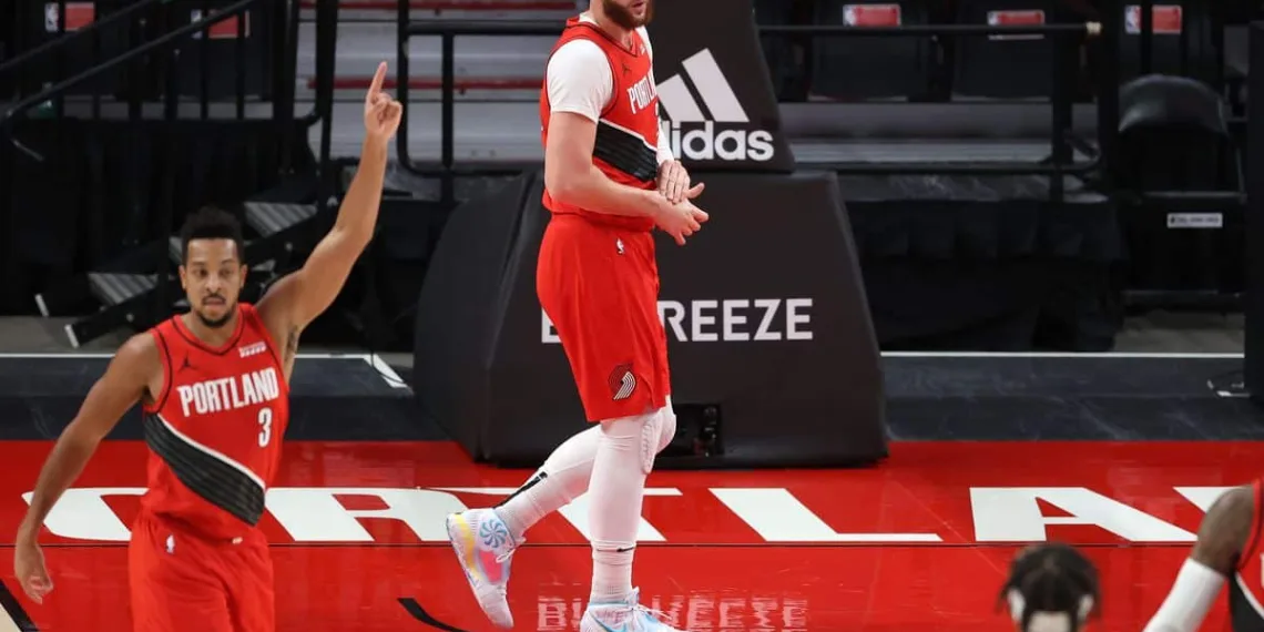 Jusuf Nurkic holds his right wrist during the match against Indiana Pacers.