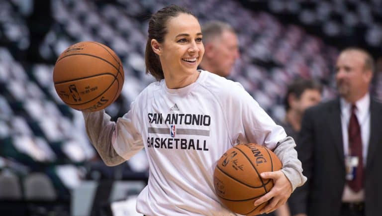 Becky Hammon becomes the first woman to serve as head coach in an NBA game