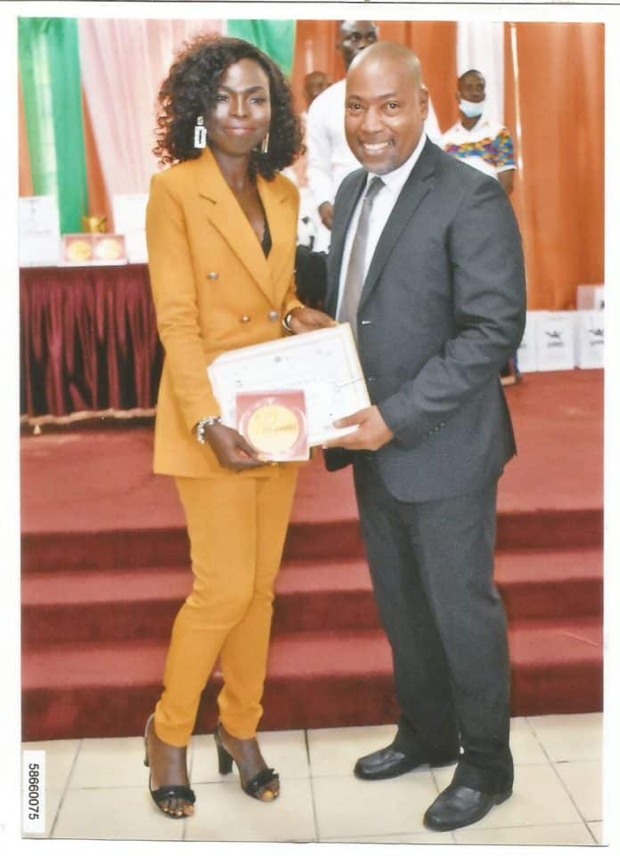 Paule Ella Guei Receiving SportsPlus Award