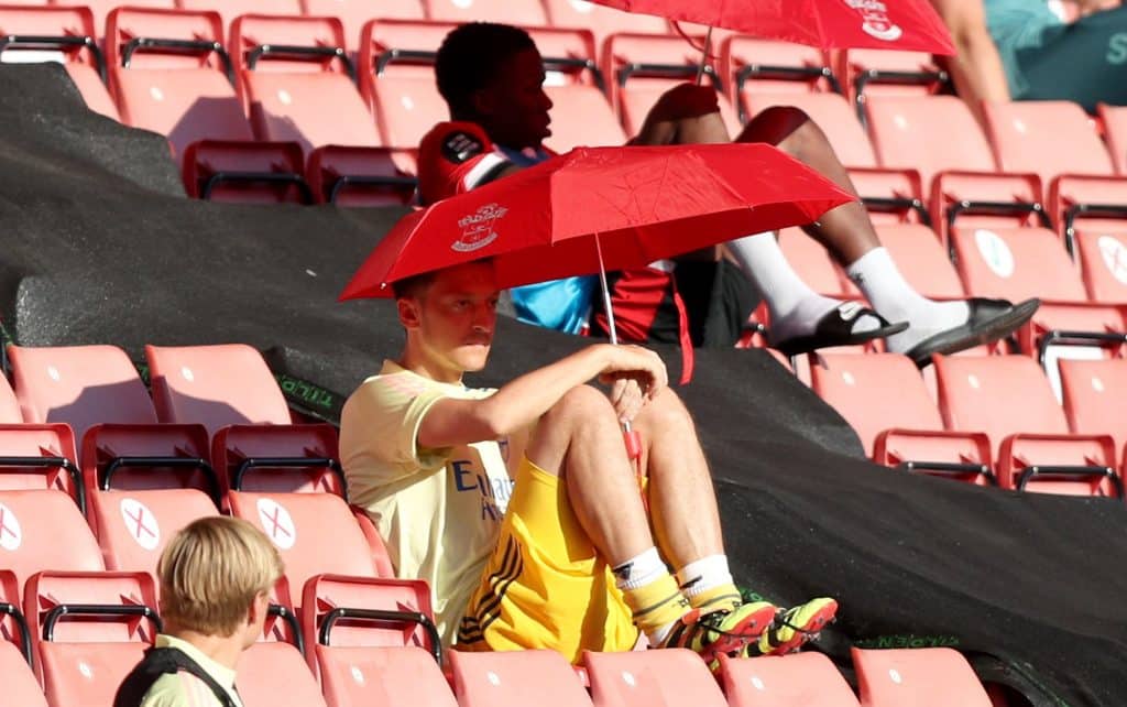 ozil umbrella An update on Mesut Ozil's future