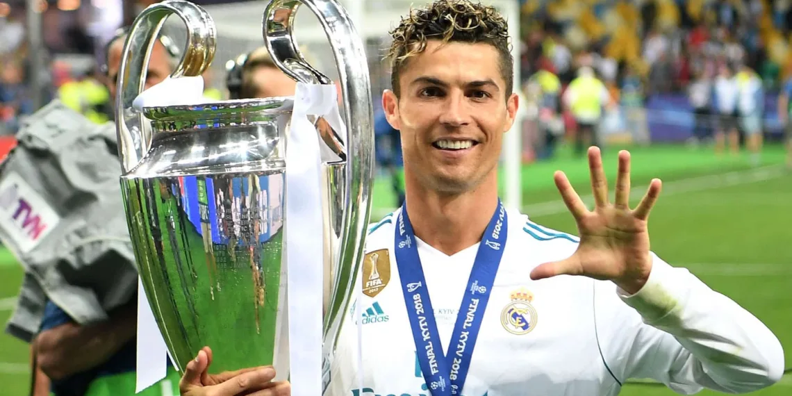 KIEV, UKRAINE - MAY 26:  Cristiano Ronaldo of Real Madrid lifts The UEFA Champions League trophy following his sides victory in during the UEFA Champions League Final between Real Madrid and Liverpool at NSC Olimpiyskiy Stadium on May 26, 2018 in Kiev, Ukraine.  (Photo by Michael Regan/Getty Images)