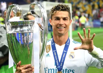 KIEV, UKRAINE - MAY 26:  Cristiano Ronaldo of Real Madrid lifts The UEFA Champions League trophy following his sides victory in during the UEFA Champions League Final between Real Madrid and Liverpool at NSC Olimpiyskiy Stadium on May 26, 2018 in Kiev, Ukraine.  (Photo by Michael Regan/Getty Images)