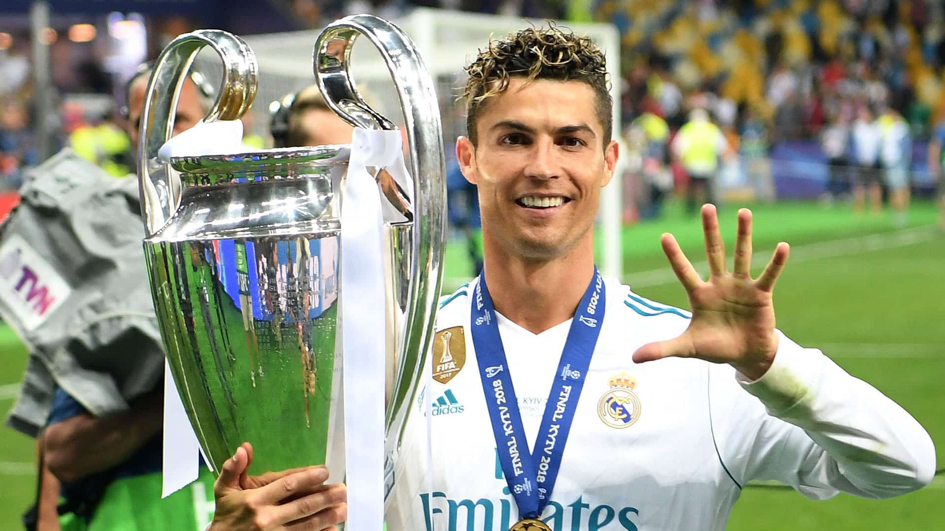 KIEV, UKRAINE - MAY 26:  Cristiano Ronaldo of Real Madrid lifts The UEFA Champions League trophy following his sides victory in during the UEFA Champions League Final between Real Madrid and Liverpool at NSC Olimpiyskiy Stadium on May 26, 2018 in Kiev, Ukraine.  (Photo by Michael Regan/Getty Images)