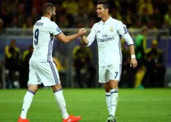 DORTMUND, GERMANY - SEPTEMBER 27:  Karim Benzema and Cristiano Ronaldo of Real Madrid (7) celebrate as Raphael Varane of Real Madrid scores their second goal during the UEFA Champions League Group F match between Borussia Dortmund and Real Madrid CF at Signal Iduna Park on September 27, 2016 in Dortmund, North Rhine-Westphalia.  (Photo by Dean Mouhtaropoulos/Bongarts/Getty Images)