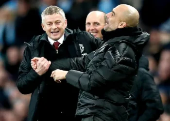 Manchester United manager Ole Gunnar Solskjaer (left) and Manchester City manager Pep Guardiola (right) enjoy a laugh on the touchline during the Premier League match at the Etihad Stadium, Manchester. PA Photo. Picture date: Saturday December 7, 2019. See PA story SOCCER Man City. Photo credit should read: Martin Rickett/PA Wire. RESTRICTIONS: EDITORIAL USE ONLY No use with unauthorised audio, video, data, fixture lists, club/league logos or "live" services. Online in-match use limited to 120 images, no video emulation. No use in betting, games or single club/league/player publications.