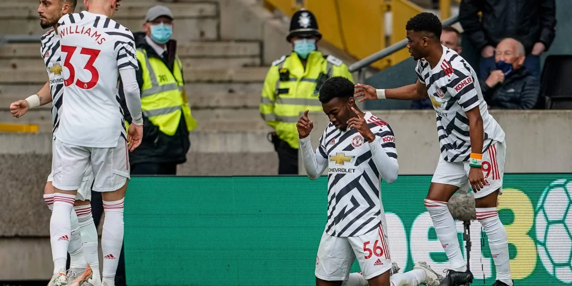 23rd May 2021 Molineux Stadium, Wolverhampton, West Midlands, England English Premier League Football, Wolverhampton Wanderers versus Manchester United, ManU Anthony Elanga of Manchester United celebrates scoring a goal in the 13th minute for a 1-0 lead PUBLICATIONxNOTxINxUK ActionPlus12290873 StevexFeeney