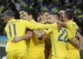 Ukrainian players celebrate as they beat Portugal on 15th October 2019 and validated their qualification for Euro 2020. Yaremchuk and Yarmolenko, in the first half, gave Shevchenko's men the lead, and Cristiano Ronaldo's 700th career goal didn't change that. Credit: Eurosport