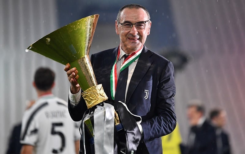 TURIN, ITALY - AUGUST 01: Juventus FC head coach, Maurizio Sarri, celebrates with the trophy after the Serie A match between Juventus and  AS Roma at Allianz Stadium on August 1, 2020 in Turin, Italy.  (Photo by Valerio Pennicino/Getty Images)